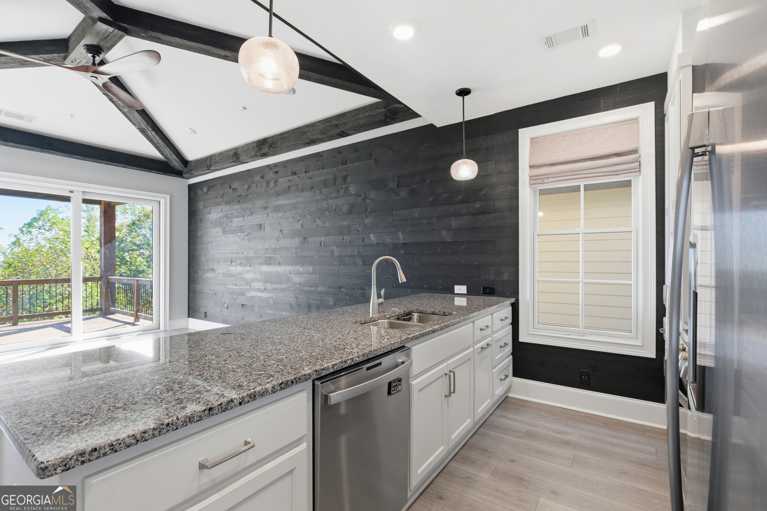 17 Cottage Lane, Unit 202 Toccoa, GA 30577 - Photo 9 of 43 a spacious bathroom with a granite countertop sink and a window