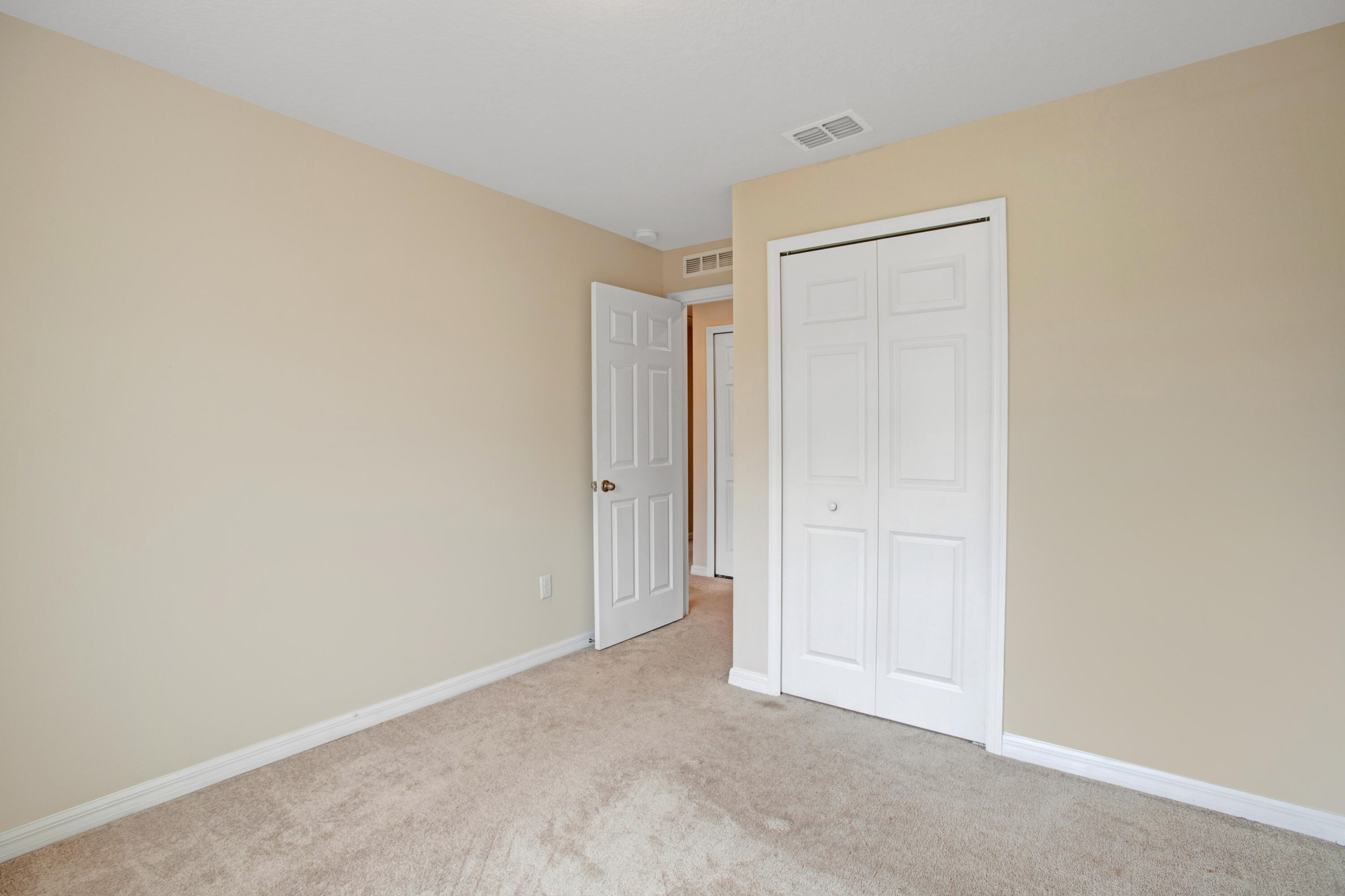 3343 Liberty Square Way, Unit 104 Fort Pierce, FL 34982 - Photo 16 of 34 a view of an empty room