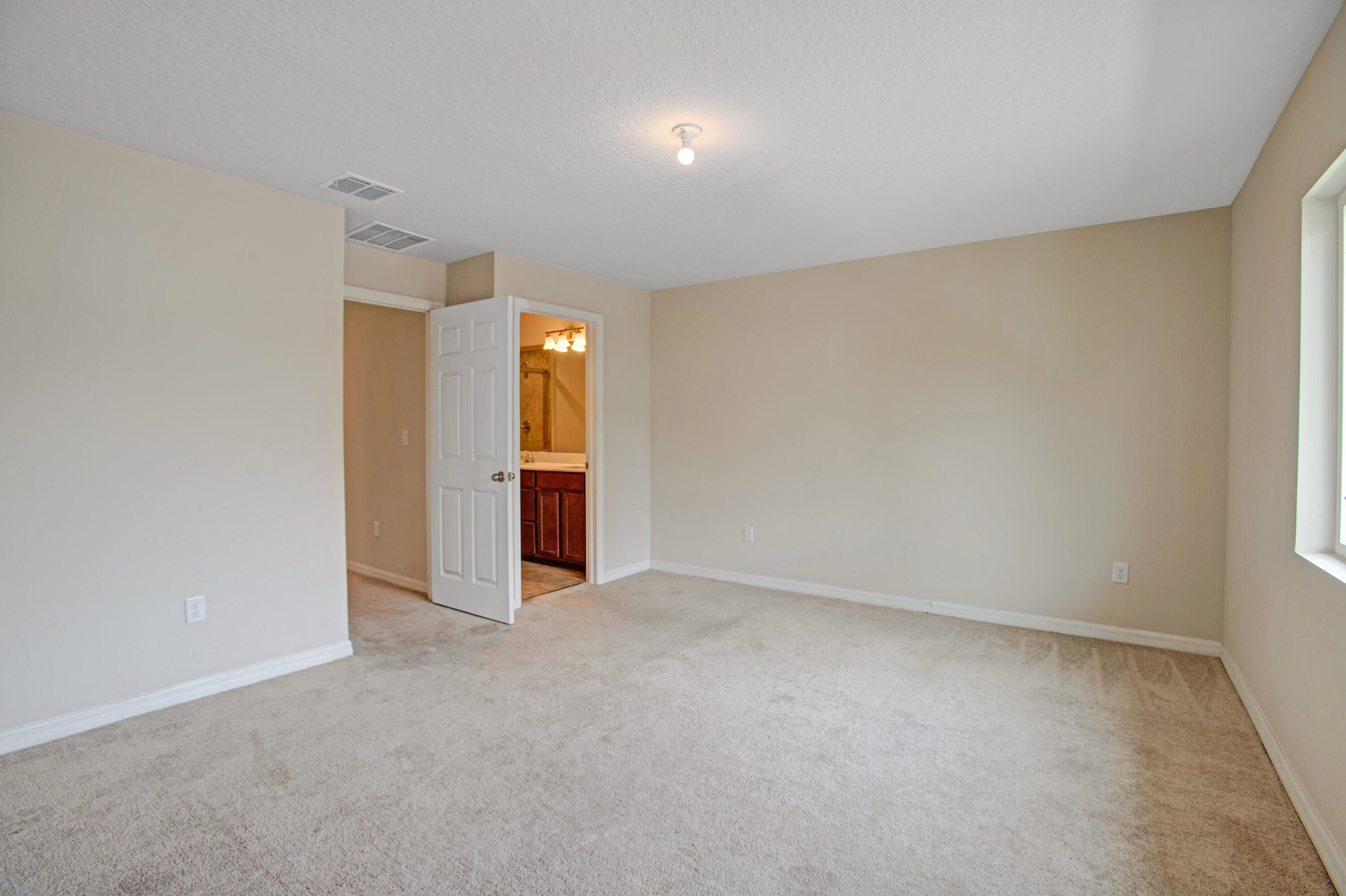 3343 Liberty Square Way, Unit 104 Fort Pierce, FL 34982 - Photo 22 of 34 a view of an empty room and fire place