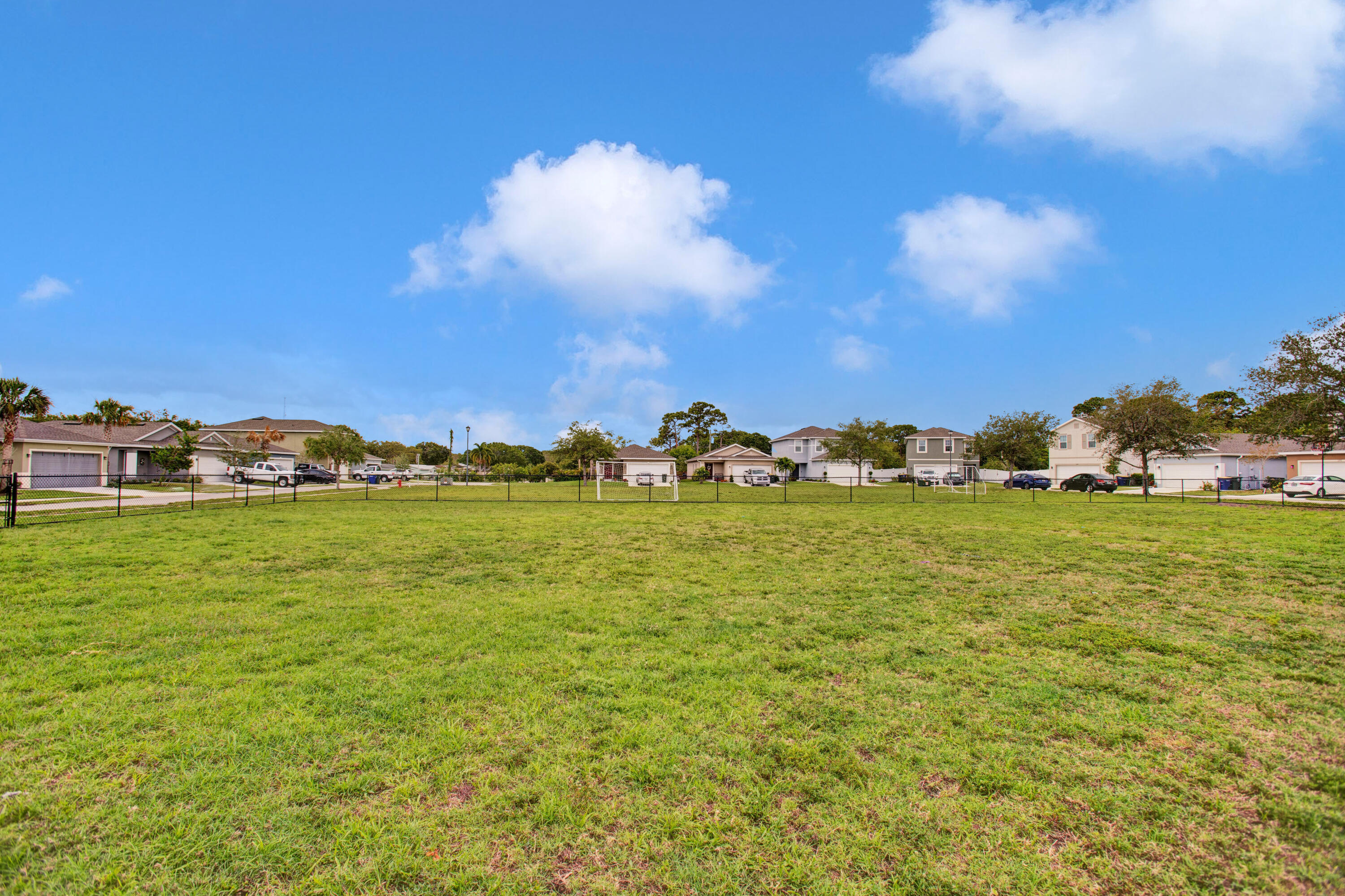 3343 Liberty Square Way, Unit 104 Fort Pierce, FL 34982 - Photo 32 of 34 a view of an ocean with beach