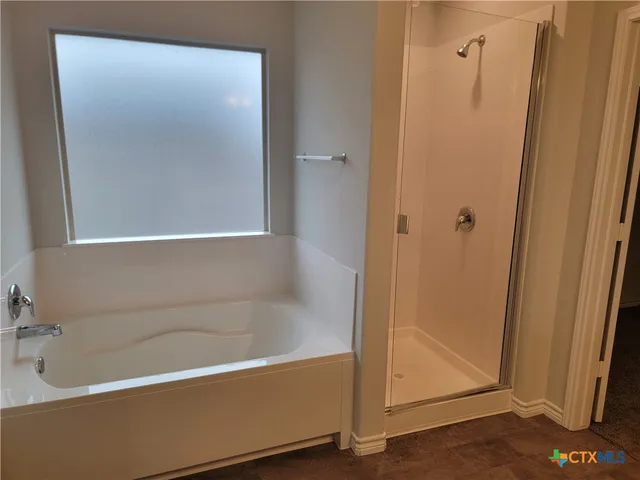 a bathroom with a bathtub