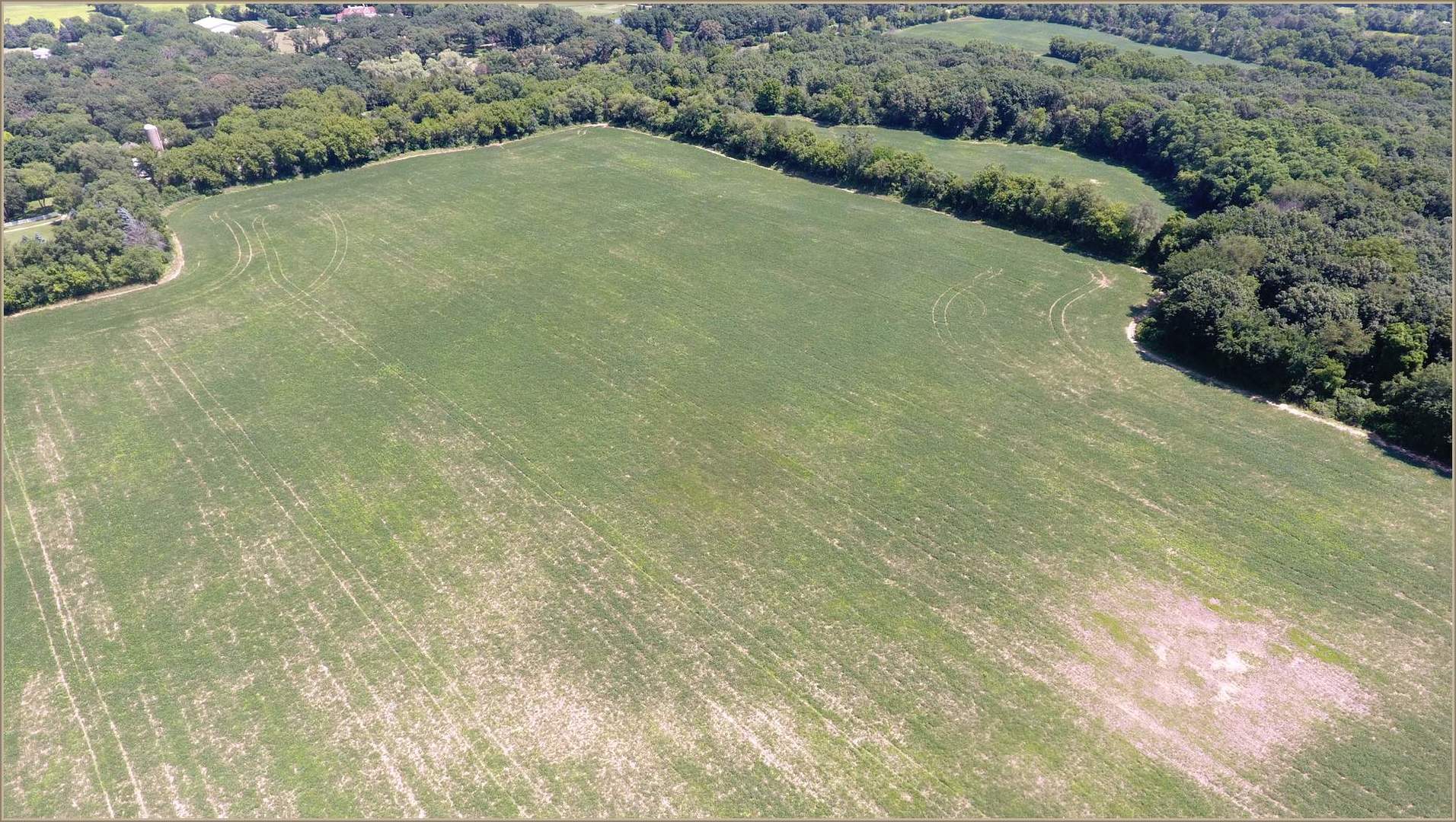 32W683 West County Line Road Barrington Hills, IL 60010 - Photo 2 of 3 a view of a field with an outdoor space