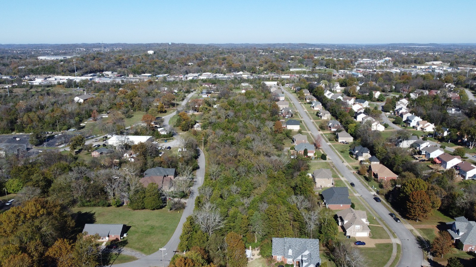 an aerial view of a city with lots of residential buildings