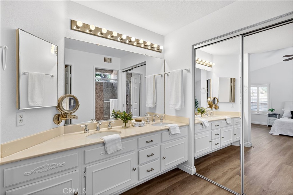 11562 Chadwick Road Corona, CA 92878 - Photo 13 of 39 Primary Bathroom Dual Sink Area, Mirrored Wardrobe