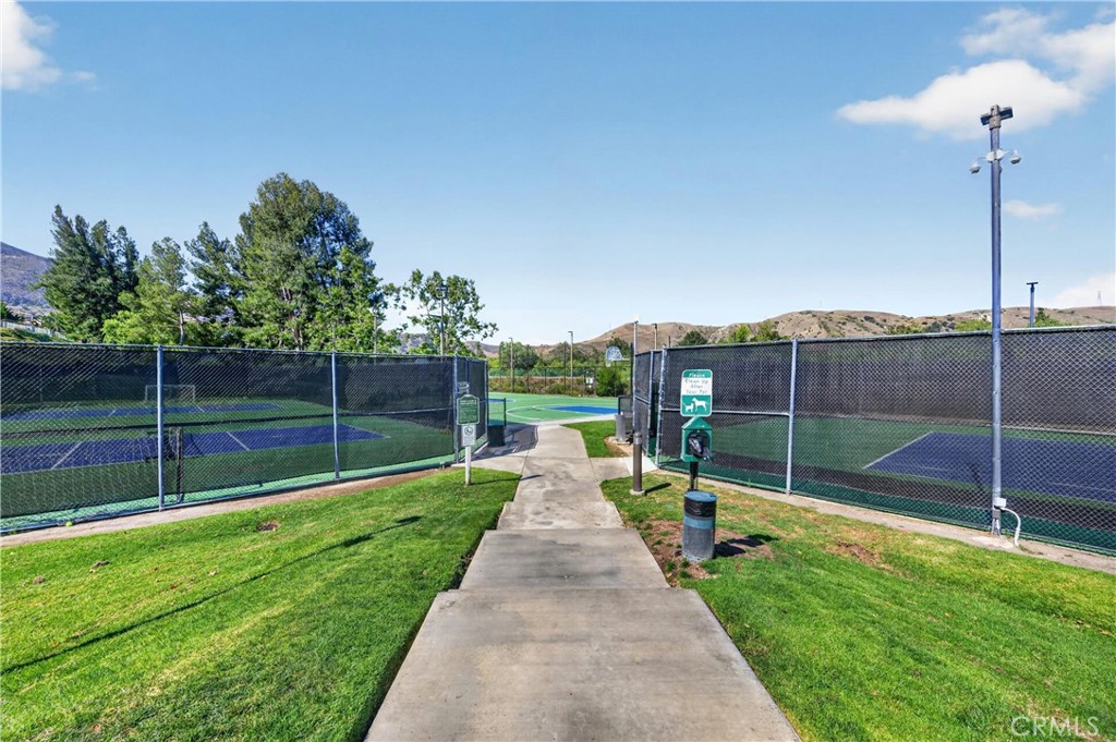 11562 Chadwick Road Corona, CA 92878 - Photo 33 of 39 Steps lead to Tennis, Pickleball, Basketball Courts, dog park and gate to bike trail