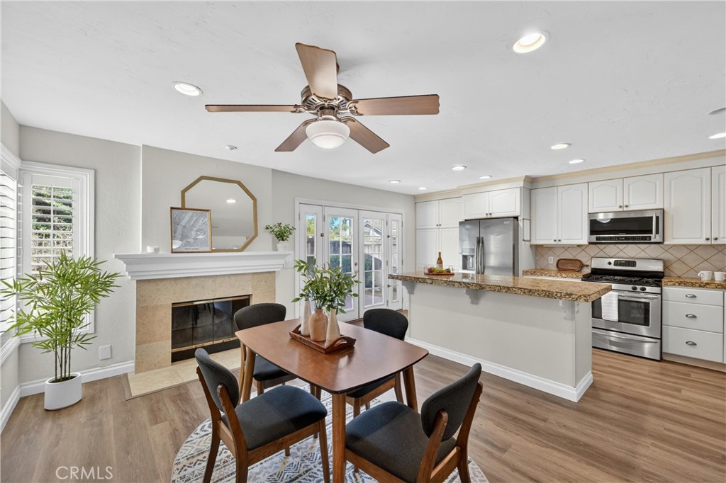11562 Chadwick Road Corona, CA 92878 - Photo 10 of 39 Informal dining and fireplace