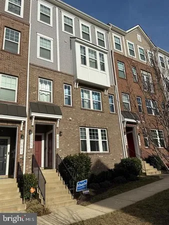 a front view of a multi story residential apartment building
