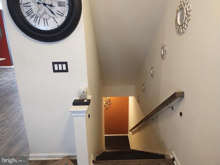 2805 Pinebrook Road, Unit 439 Landover, MD 20785 - Photo 34 of 36 a view of an entryway with paintings on the wall
