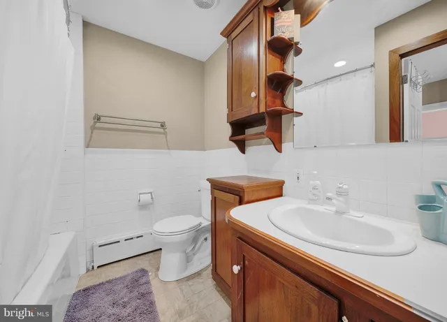a bathroom with a sink and a toilet