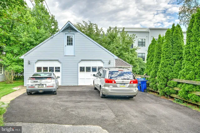 a car parked in front of a house