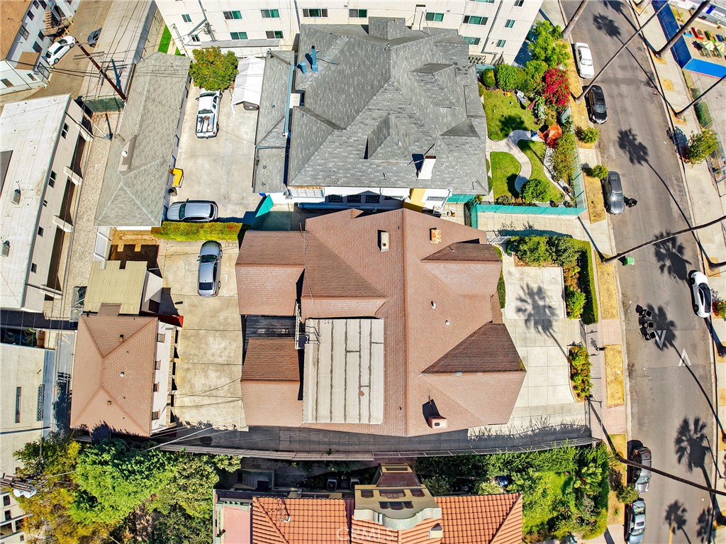 1041 Elden Avenue Los Angeles, CA 90006 - Photo 21 of 25 an aerial view of residential houses with outdoor space and parking