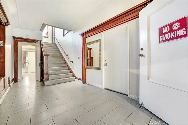 a hallway with a view of living area
