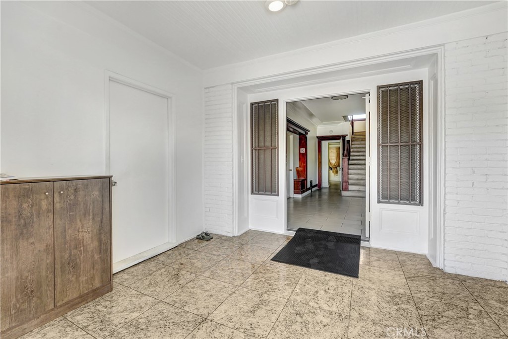 1041 Elden Avenue Los Angeles, CA 90006 - Photo 5 of 25 a hallway with a view of living area