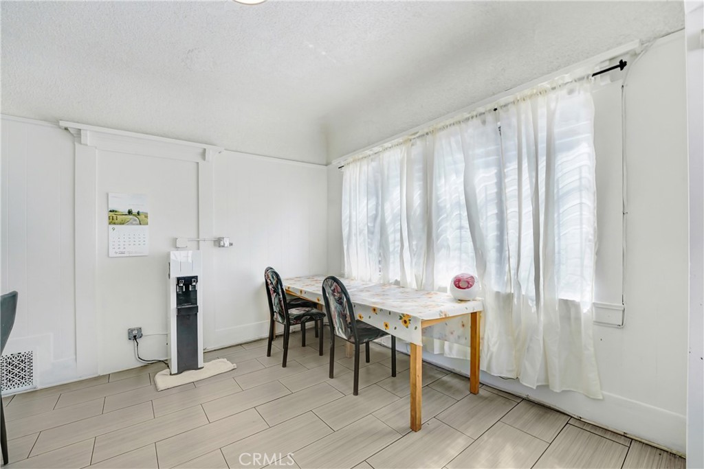 1041 Elden Avenue Los Angeles, CA 90006 - Photo 6 of 25 a view of a room with furniture and window