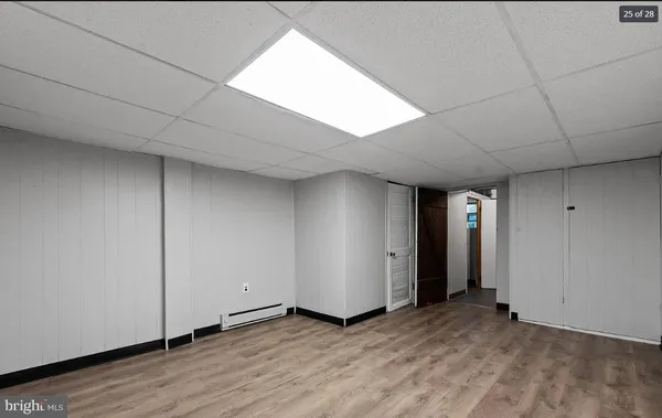 a view of a livingroom with wooden floor