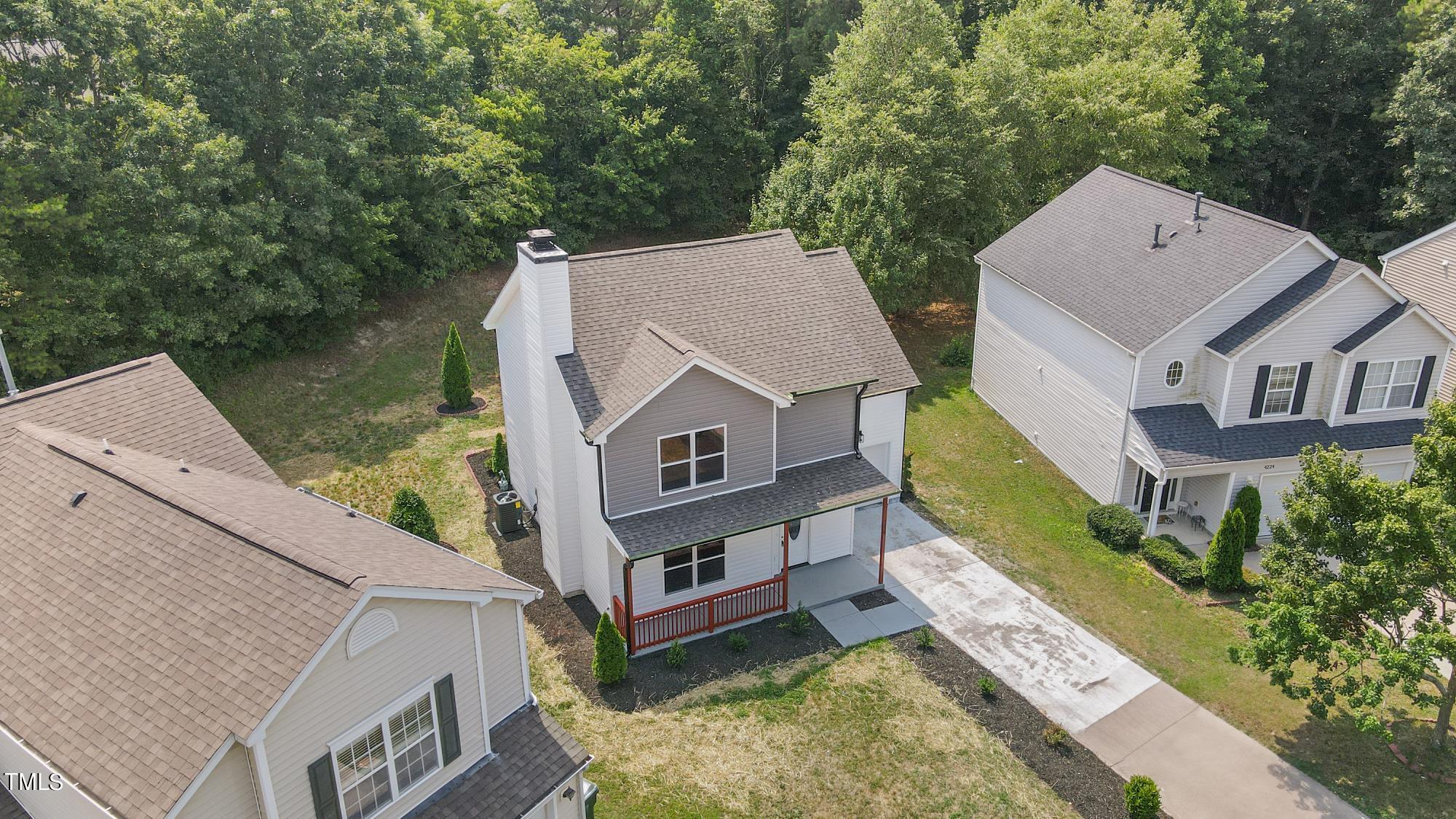 4228 Dalcross Road Raleigh, NC 27610 - Photo 3 of 27 an aerial view of a house with a yard