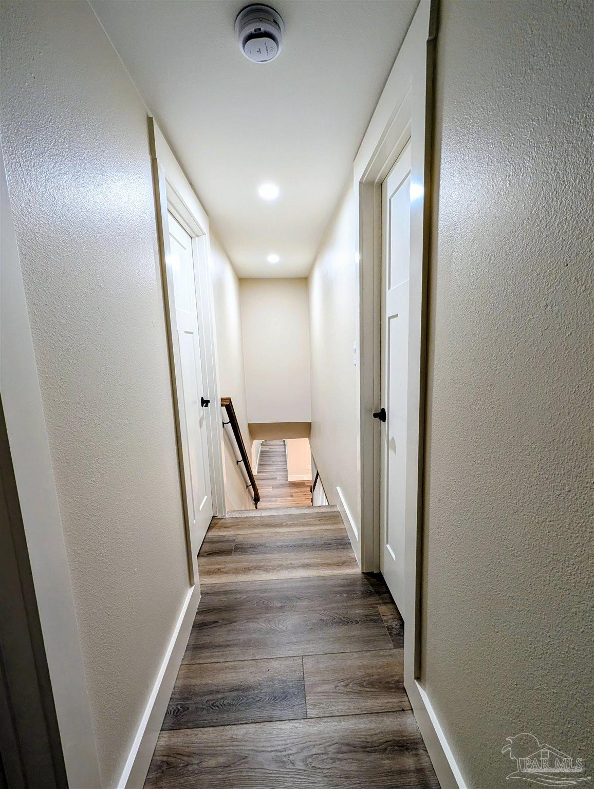 222 Santa Rosa Road Cantonment, FL 32533 - Photo 21 of 48 a view of entryway with wooden floor and stairs