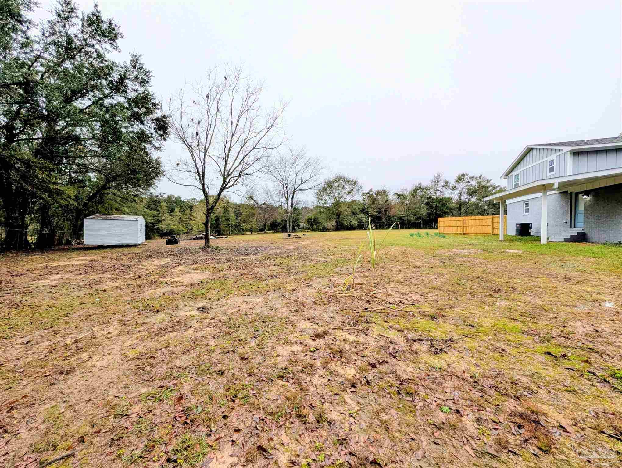 222 Santa Rosa Road Cantonment, FL 32533 - Photo 46 of 48 a view of a lake with houses