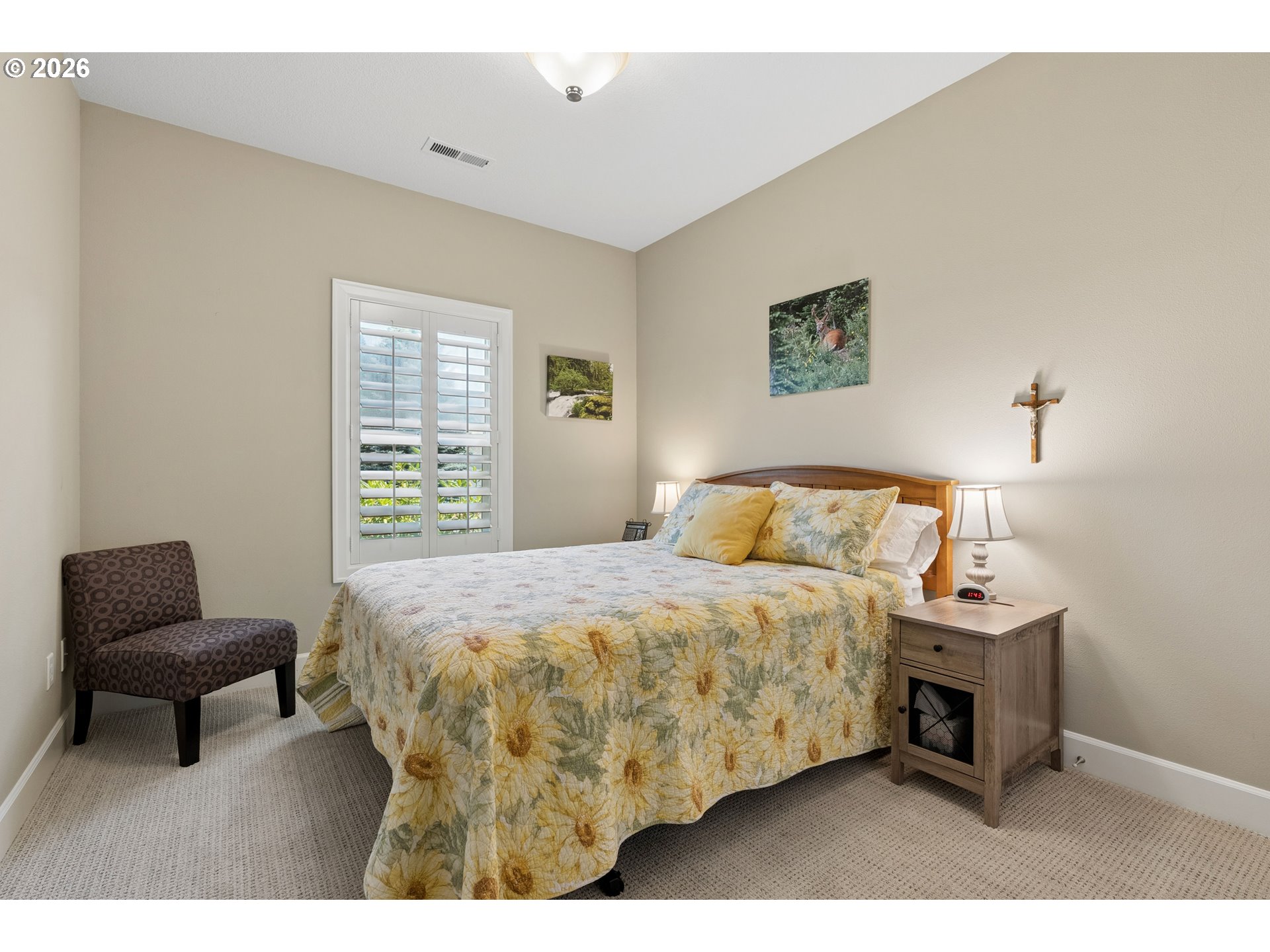945 Northwest Angel Heights Road Stevenson, WA 98648 - Photo 23 of 41 a bedroom with a bed and a chair