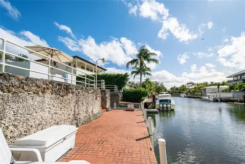a view of swimming pool with outdoor seating