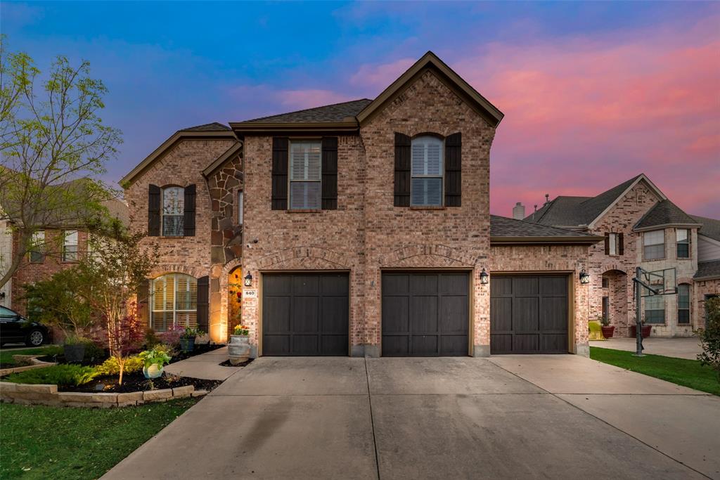 840 Ethan Road Lantana, TX 76226 - Photo 1 of 1 a front view of a house with yard and parking
