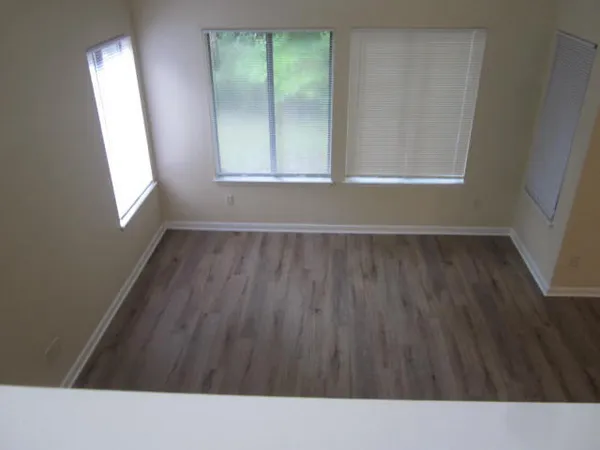 a room with a sink and a mirror