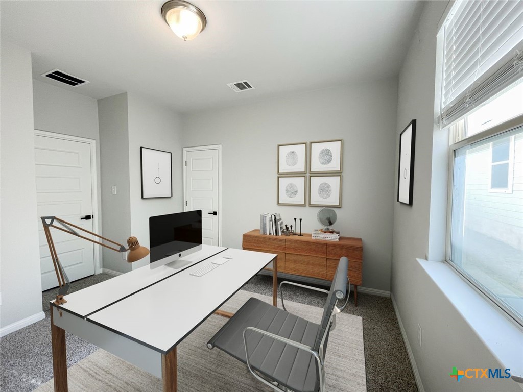 108 Old Stagecoach Road Jarrell, TX 76537 - Photo 32 of 45 a bed room with a bed and a window