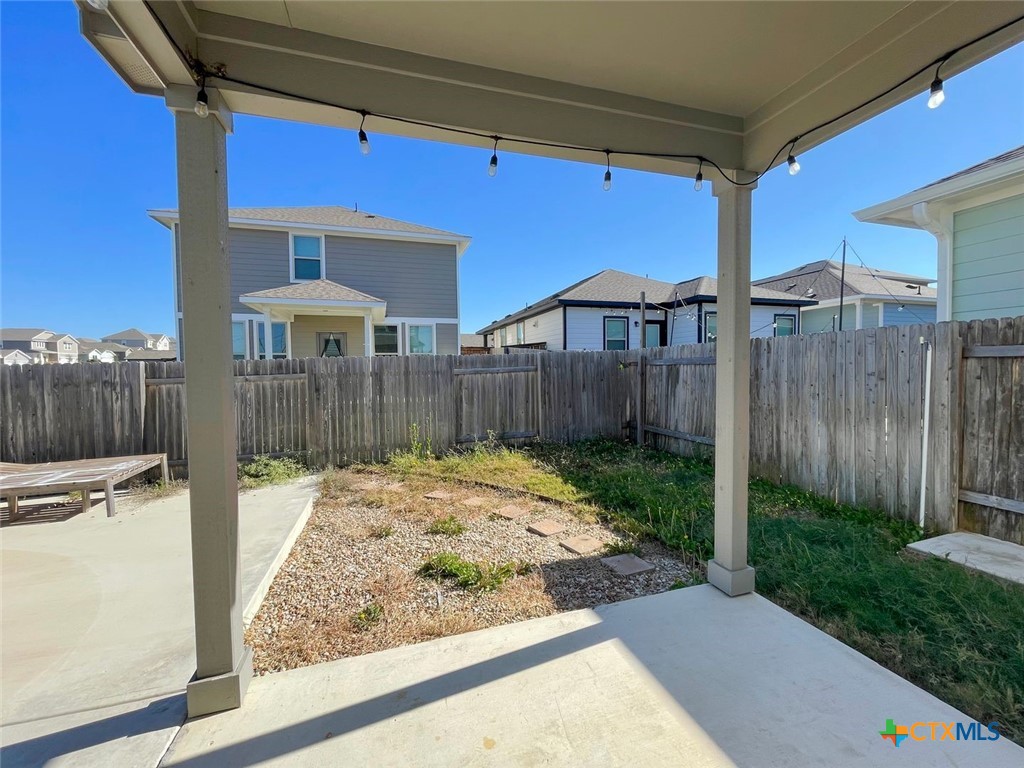 108 Old Stagecoach Road Jarrell, TX 76537 - Photo 38 of 45 a view of a backyard with wooden fence