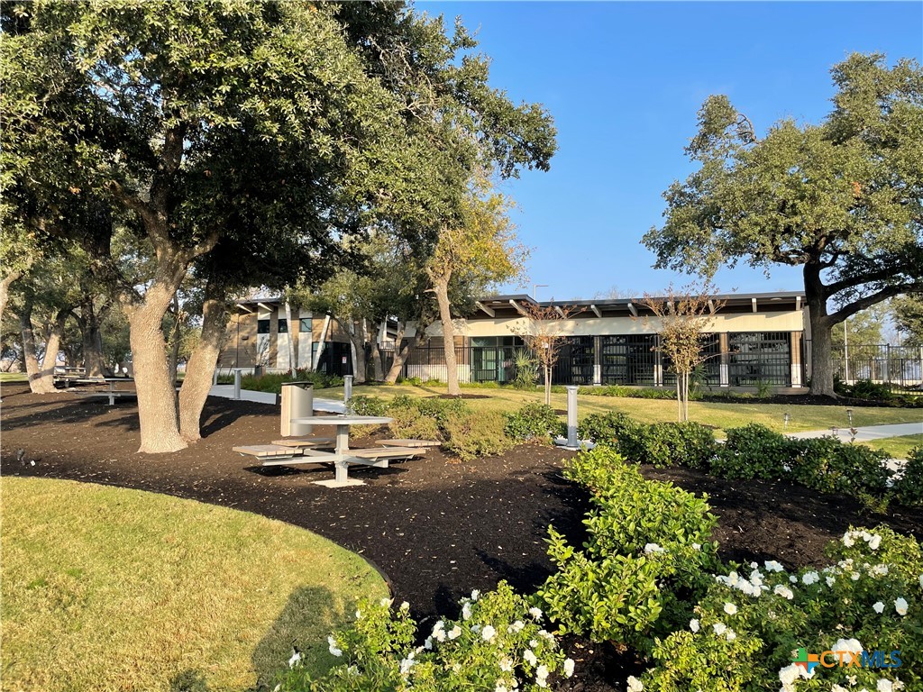 108 Old Stagecoach Road Jarrell, TX 76537 - Photo 41 of 45 a front view of a house with a garden