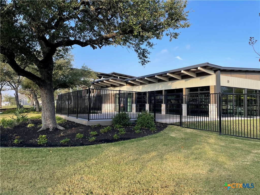 108 Old Stagecoach Road Jarrell, TX 76537 - Photo 42 of 45 a front view of a house with a garden