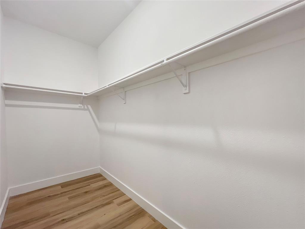 4006 Coolidge Street Dallas, TX 75215 - Photo 22 of 27 a view of a room with wooden floor