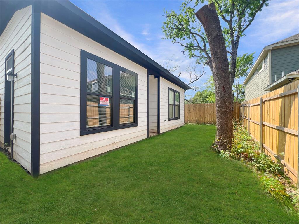 4006 Coolidge Street Dallas, TX 75215 - Photo 27 of 27 a view of front door of house with yard