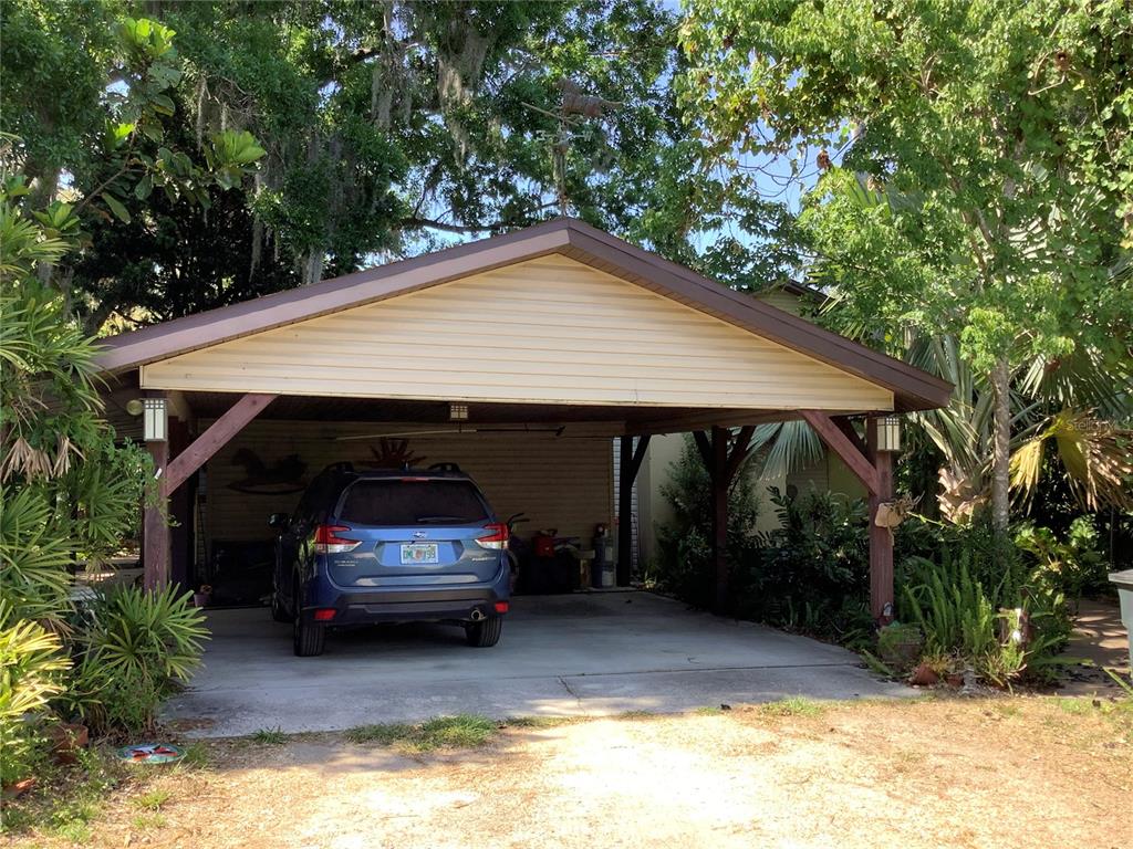 16921 Crawley Road Odessa, FL 33556 - Photo 25 of 33 a car parked in front of a house