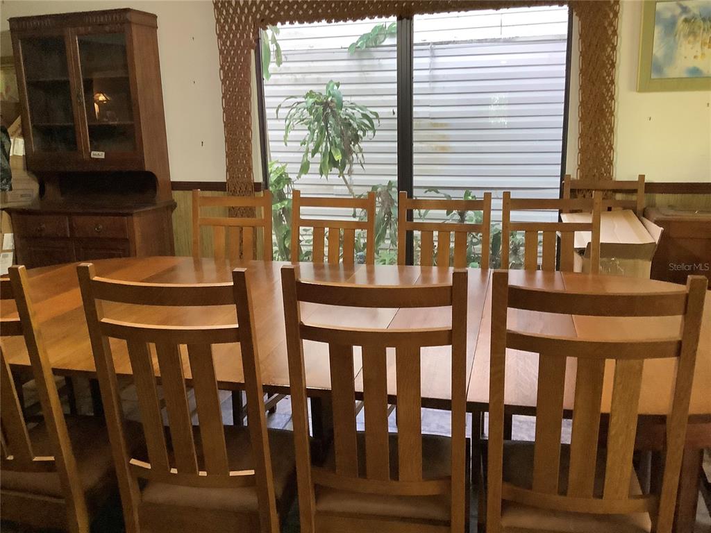 16921 Crawley Road Odessa, FL 33556 - Photo 8 of 33 a view of a brick house with large windows