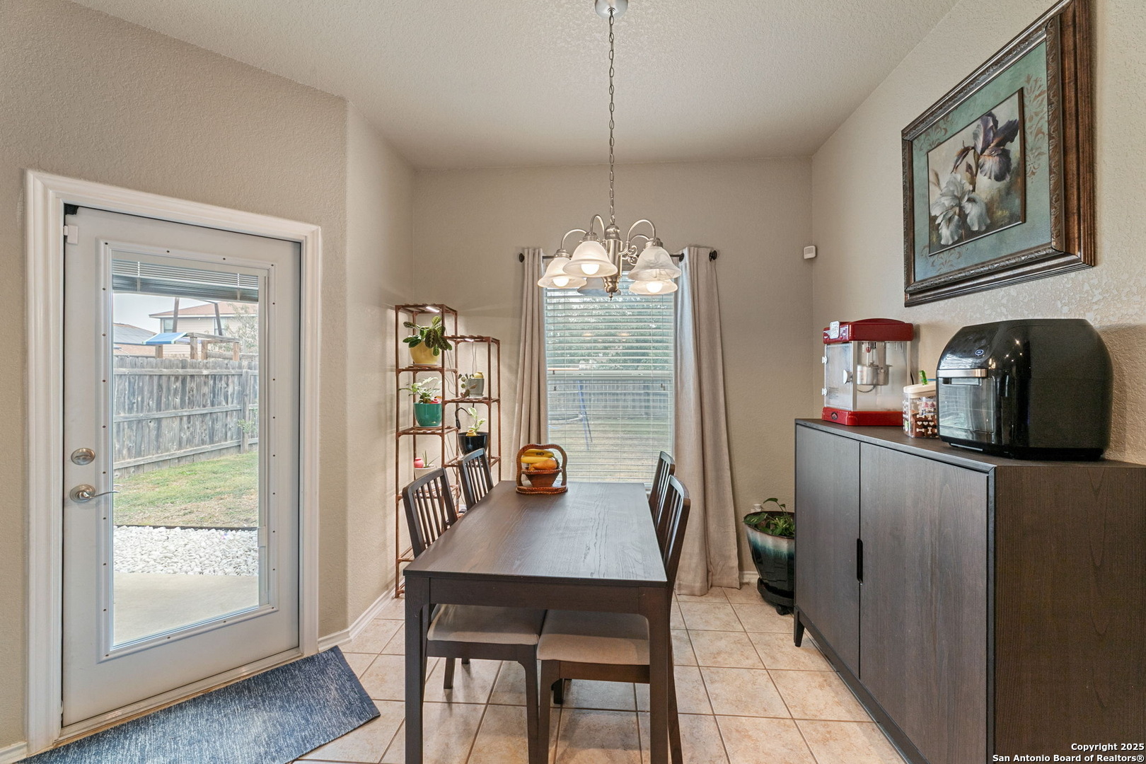 3850 Key W Way Converse, TX 78109 - Photo 13 of 24 a view of a dining room with furniture and window