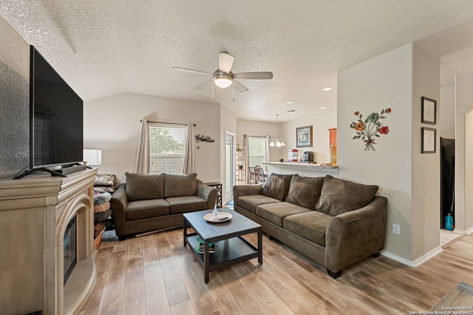3850 Key W Way Converse, TX 78109 - Photo 6 of 24 a living room with furniture and a flat screen tv