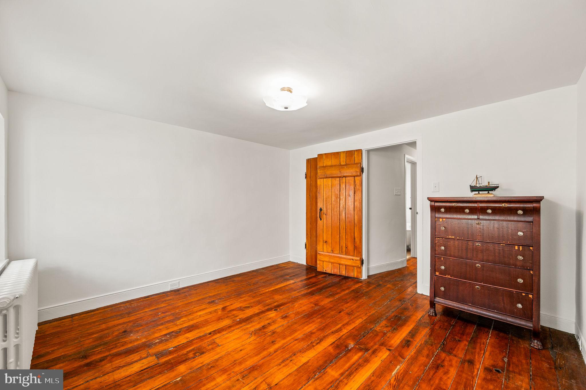 73 West Rose Valley Road Rose Valley, PA 19086 - Photo 15 of 38 a view of room with wooden floor and closet