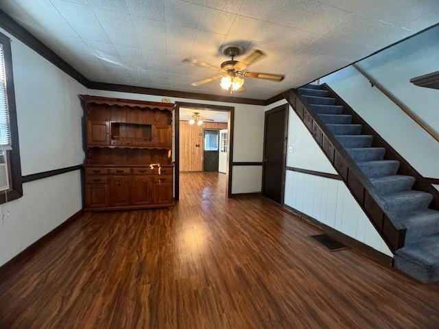 937 Butler Road Kittanning, PA 16201 - Photo 4 of 19 a view of an empty room with wooden floor and a ceiling fan