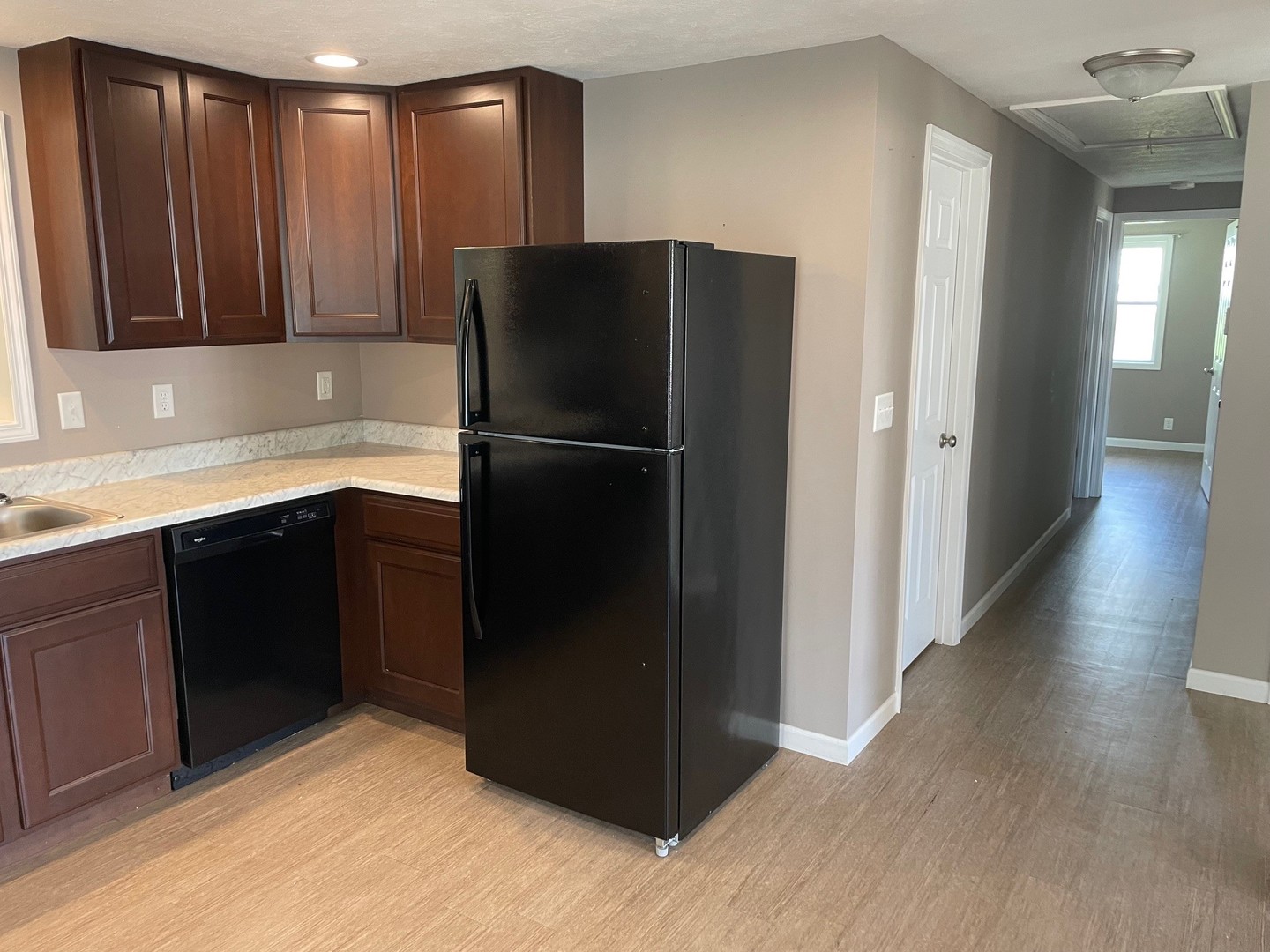 304 South Webster Street Mackinaw, IL 61755 - Photo 12 of 25 a kitchen with stainless steel appliances granite countertop a refrigerator and a sink