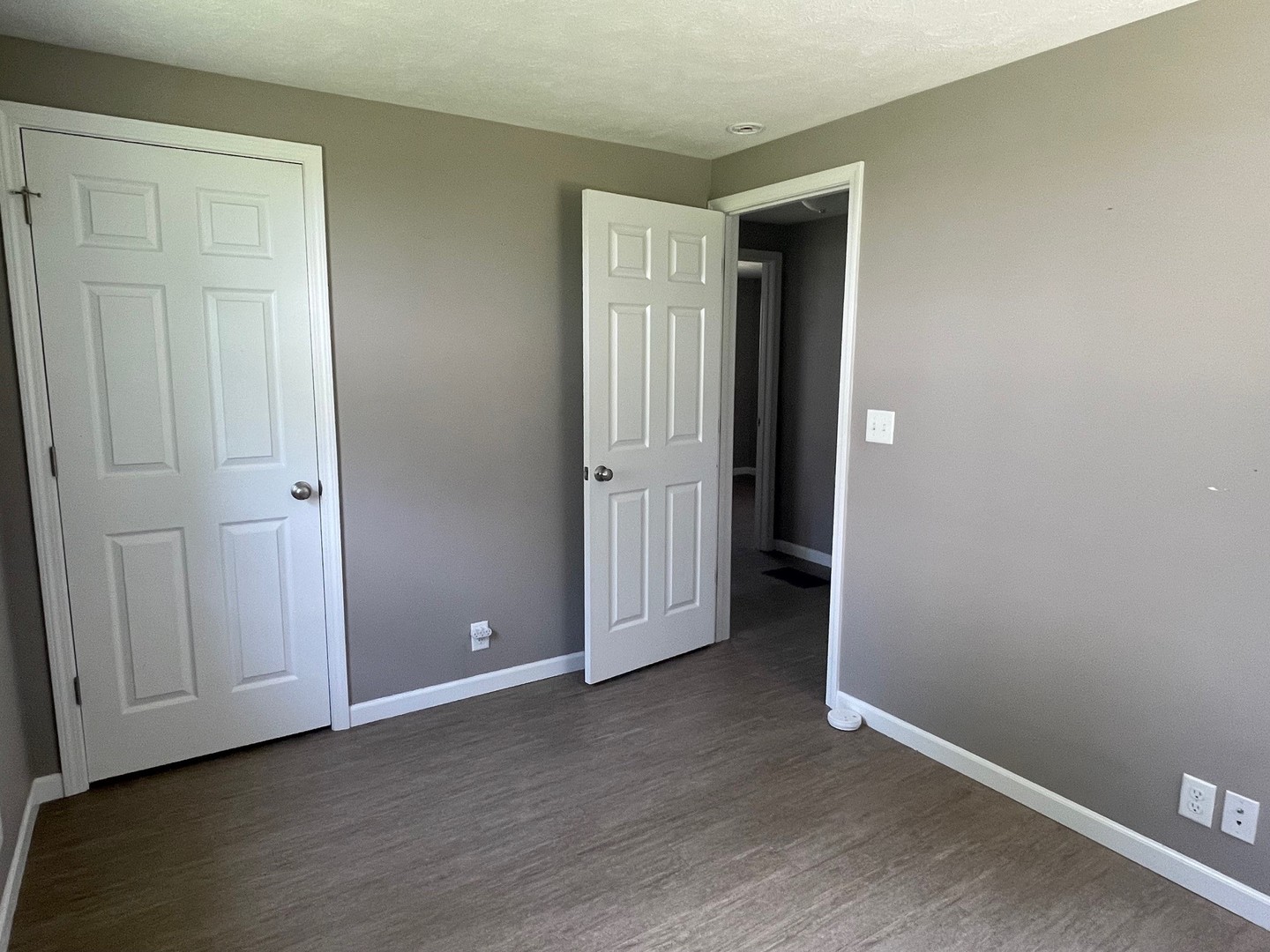 304 South Webster Street Mackinaw, IL 61755 - Photo 6 of 25 an empty room with wooden floor and closet