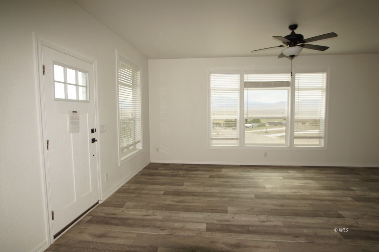 196 Tuolumne Road Bishop, CA 93514 - Photo 13 of 28 a view of an empty room with a window