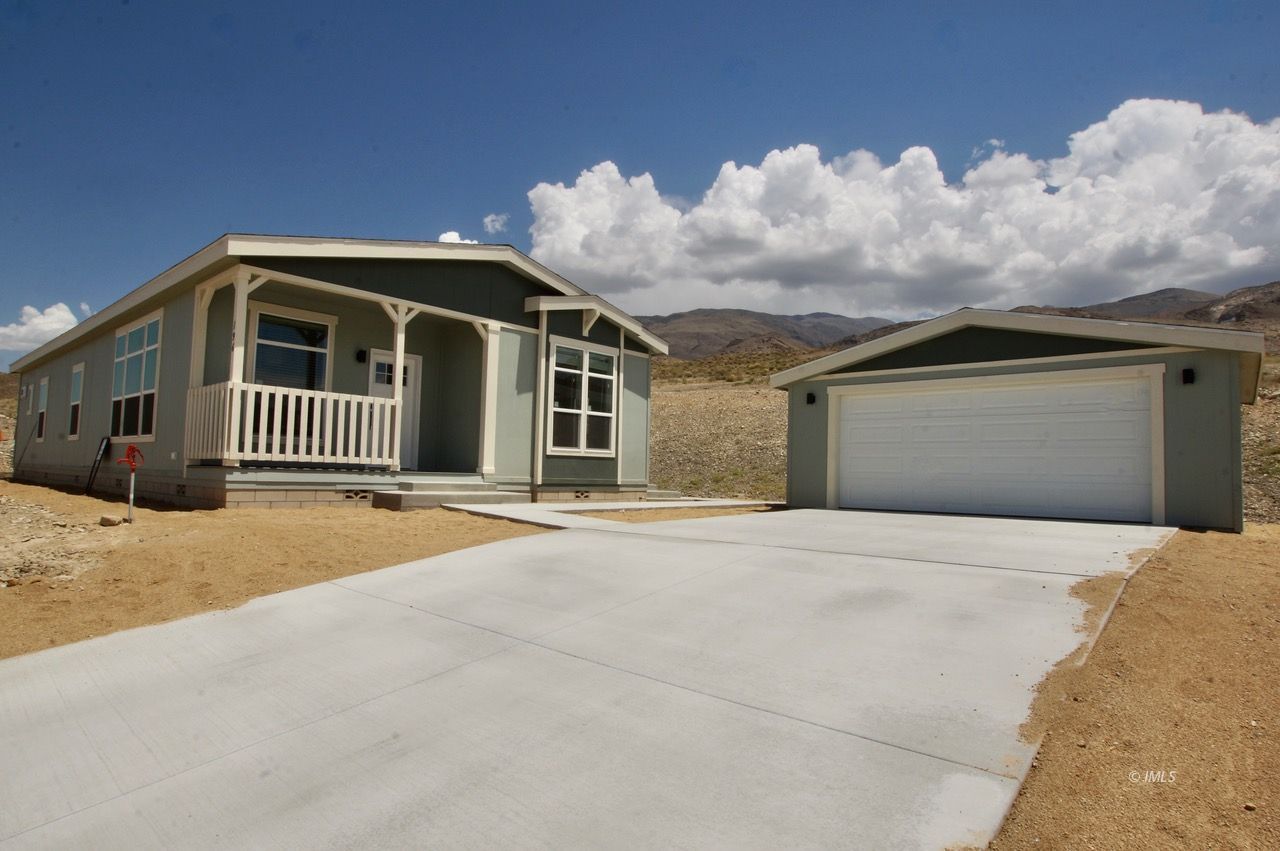 196 Tuolumne Road Bishop, CA 93514 - Photo 3 of 28 a view of a house with a outdoor space