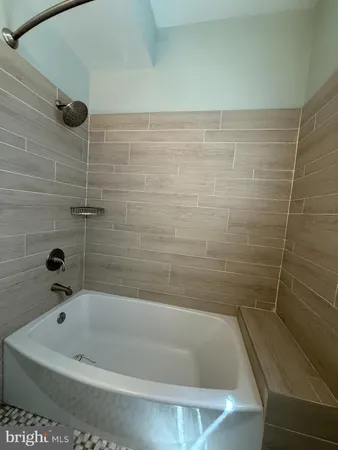 a bathroom with a bathtub