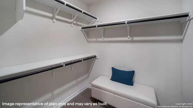 a bathroom with a shower and toilet