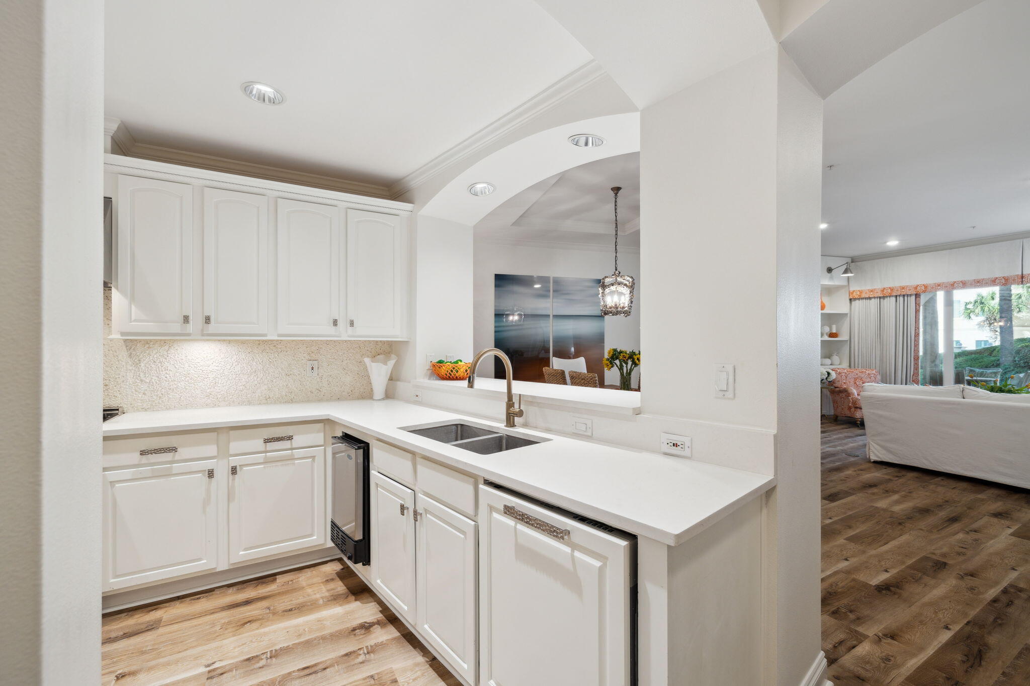 56 Blue Mountain Road, Unit B105 Santa Rosa Beach, FL 32459 - Photo 21 of 98 a kitchen with a sink stove and cabinets