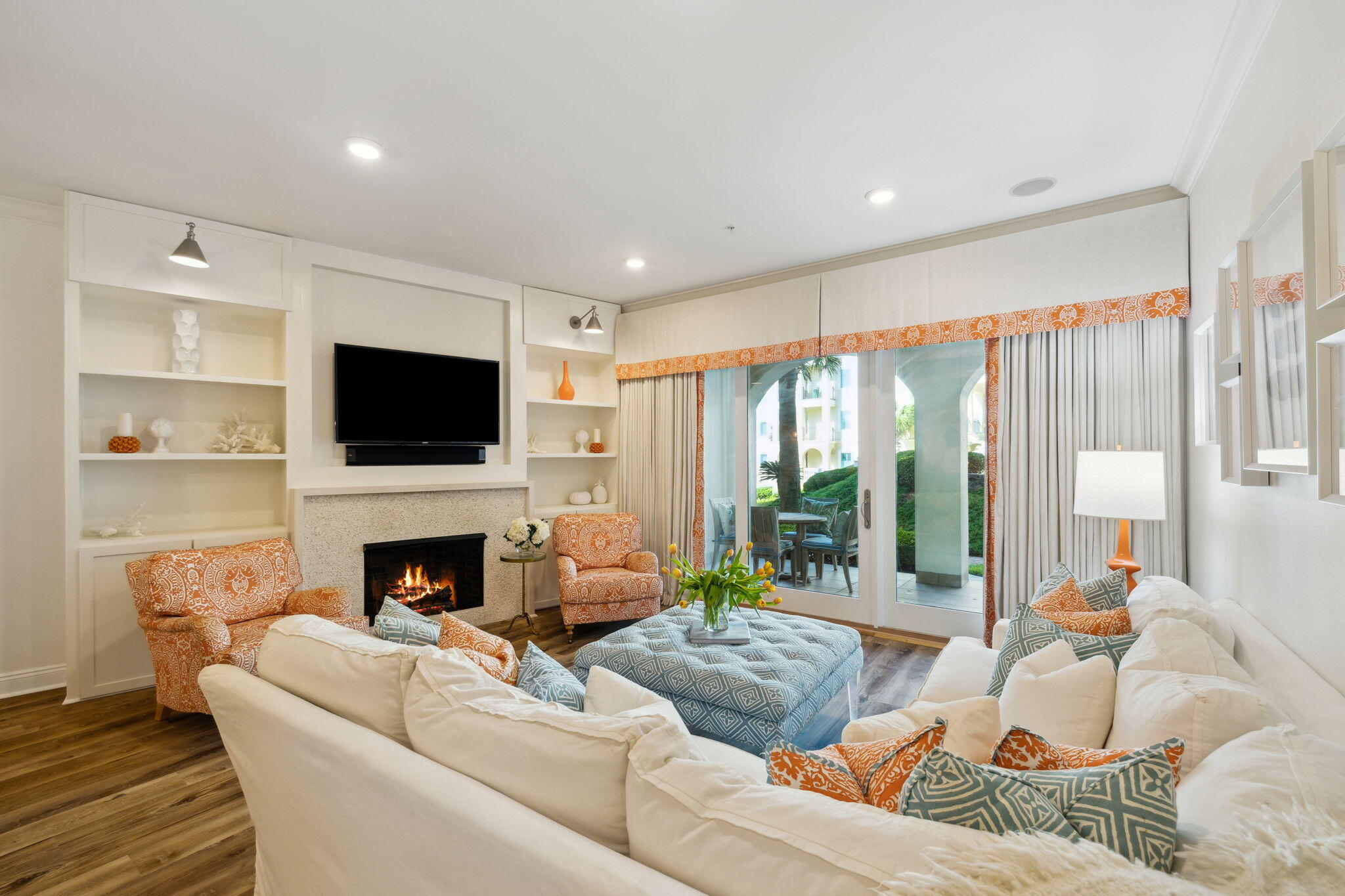 56 Blue Mountain Road, Unit B105 Santa Rosa Beach, FL 32459 - Photo 30 of 98 a living room with furniture fireplace and flat screen tv