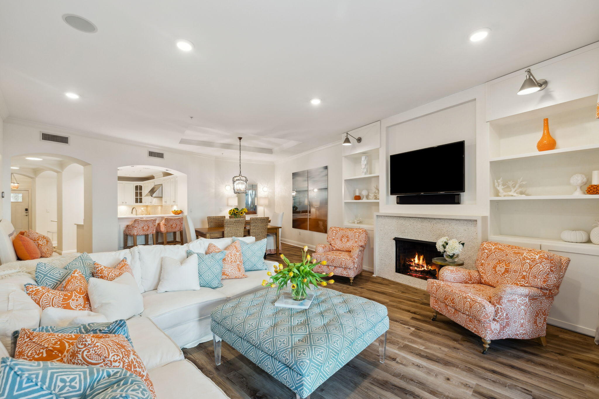 56 Blue Mountain Road, Unit B105 Santa Rosa Beach, FL 32459 - Photo 32 of 98 a living room with furniture flat screen tv and a fireplace