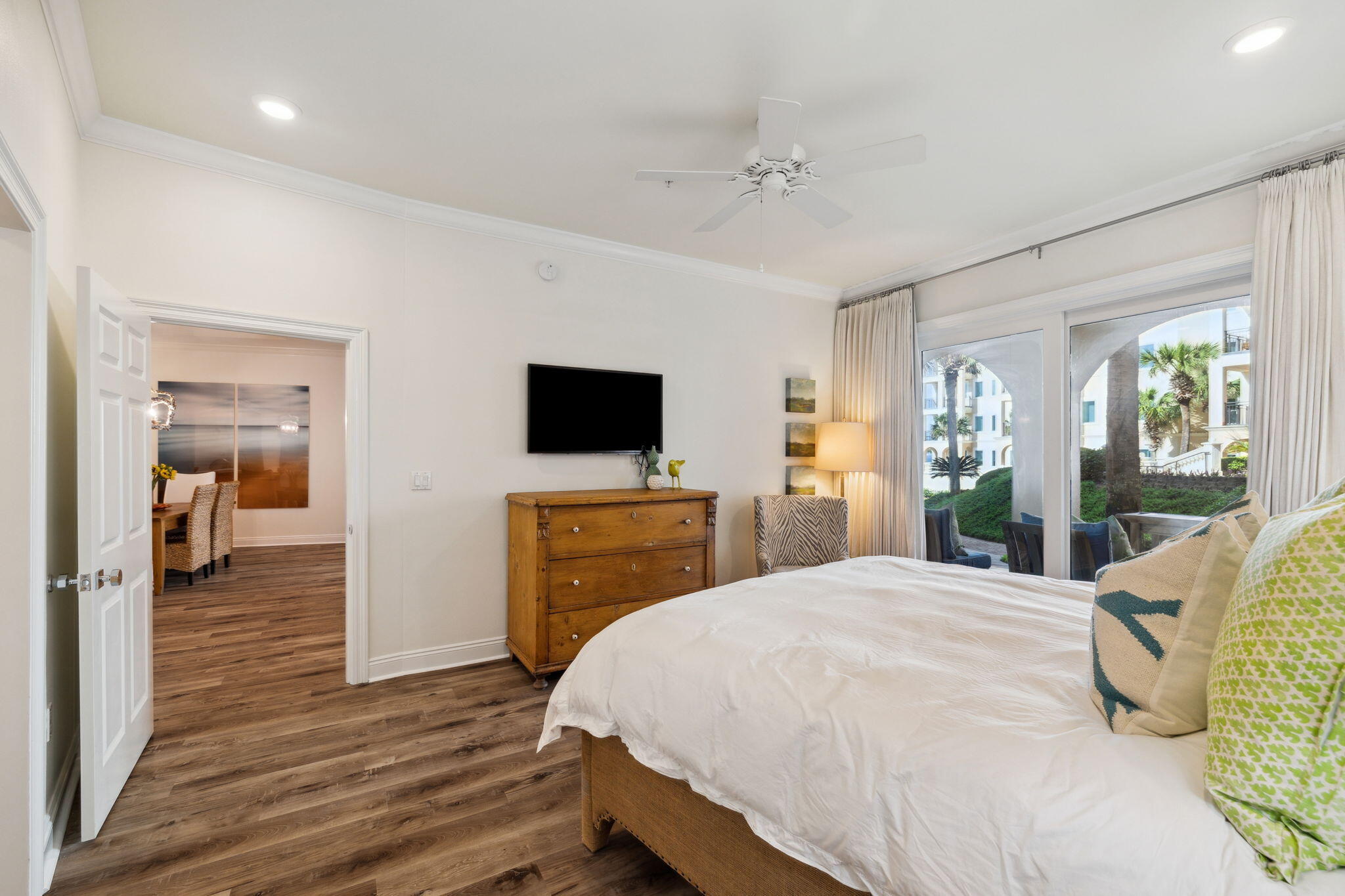 56 Blue Mountain Road, Unit B105 Santa Rosa Beach, FL 32459 - Photo 40 of 98 a bedroom with a bed and a flat screen tv