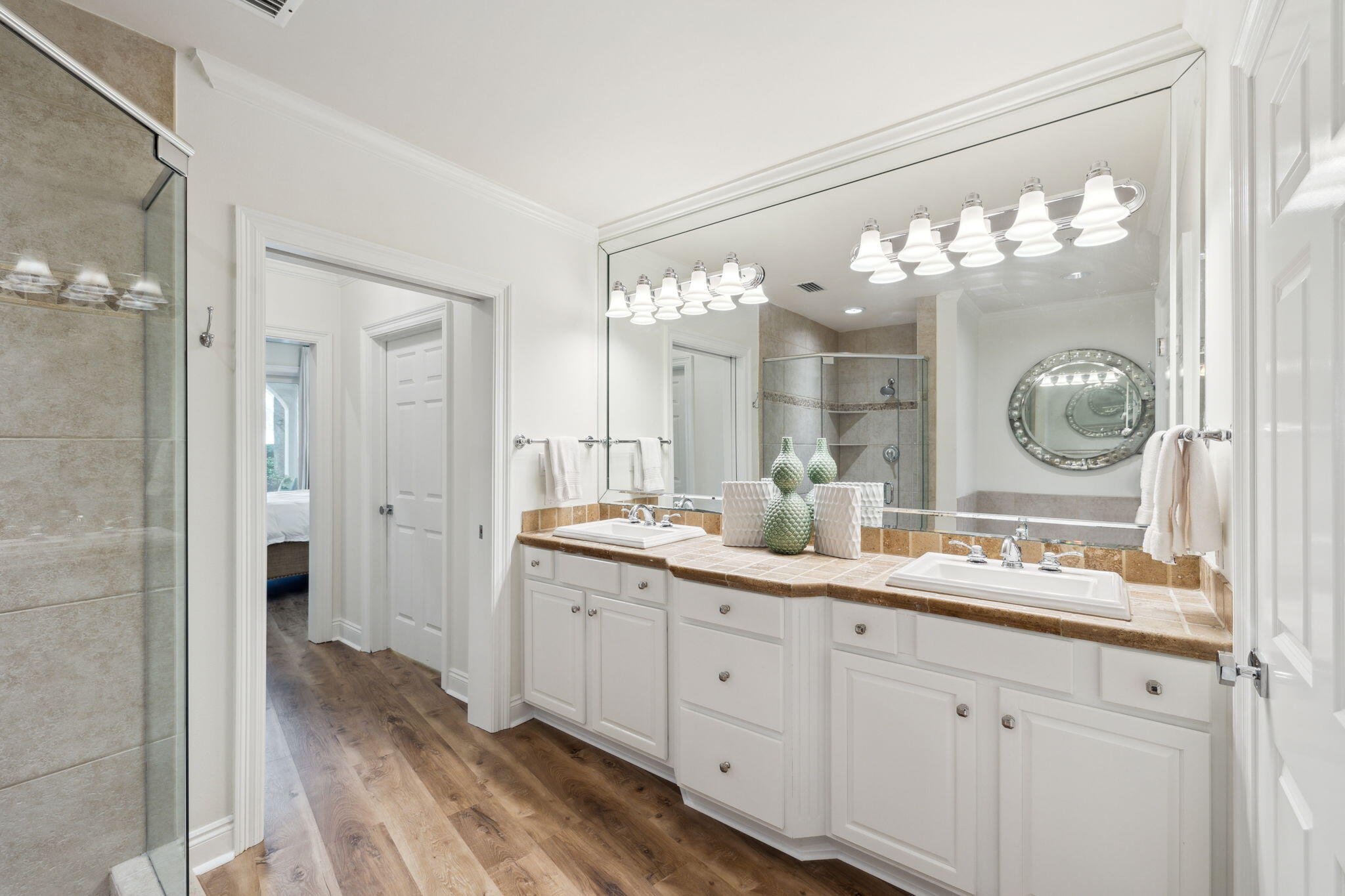 56 Blue Mountain Road, Unit B105 Santa Rosa Beach, FL 32459 - Photo 46 of 98 a spacious bathroom with a double vanity sink and a mirror