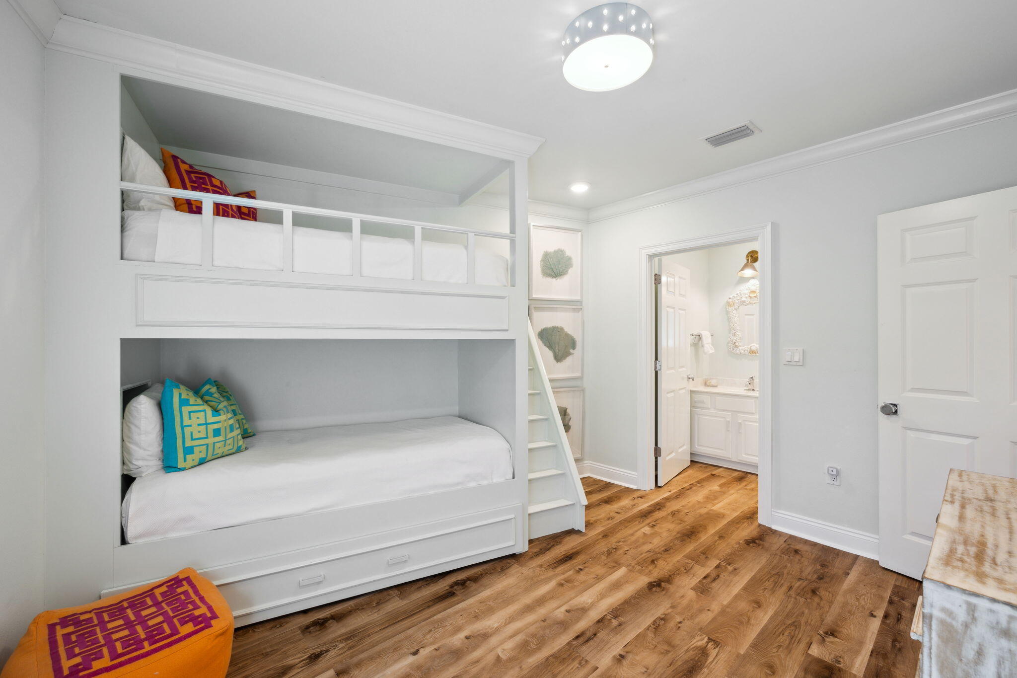 56 Blue Mountain Road, Unit B105 Santa Rosa Beach, FL 32459 - Photo 55 of 98 a bedroom with a bed and a chandelier